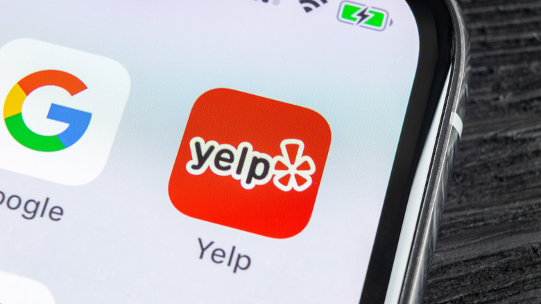 phone with Google and Yelp apps
