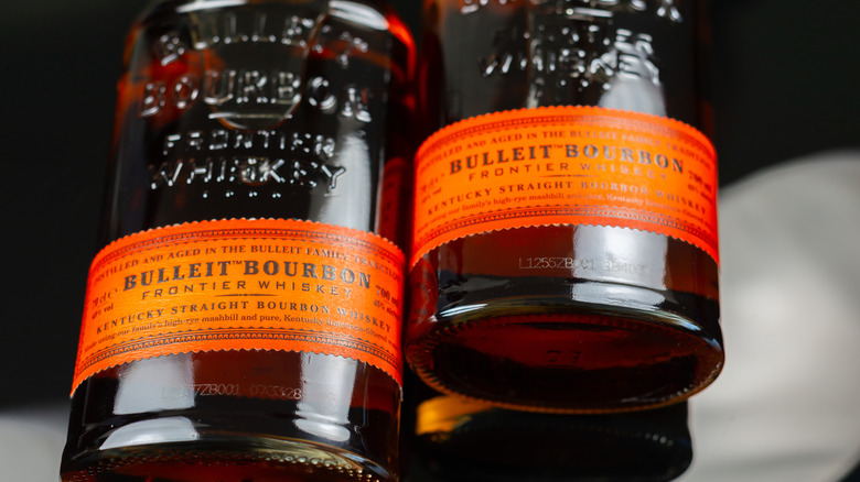 Closeup of two bottles of Bulleit bourbon