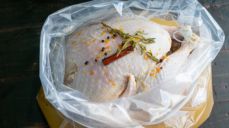 Raw turkey in brine soak