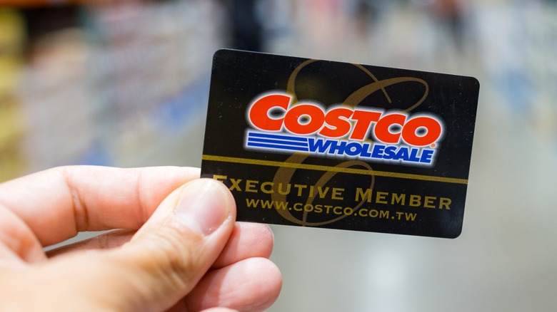 hand holding Costco card