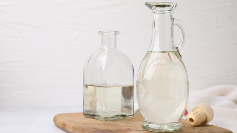 Two jars of white vinegar