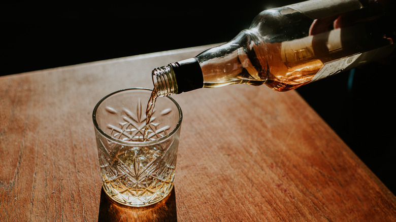 Liquor being poured into a glass