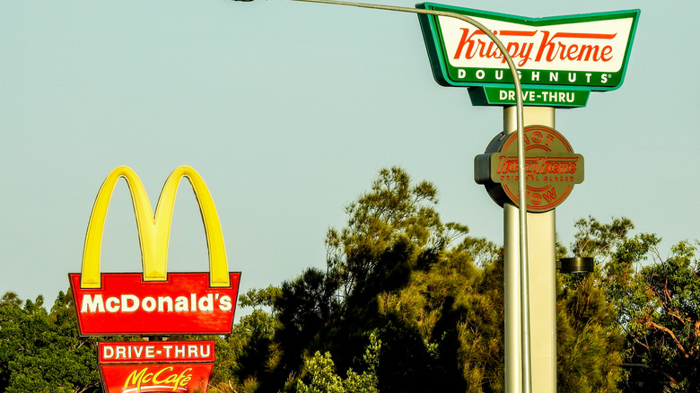 McDonald's and Krispy Kreme signs side by side