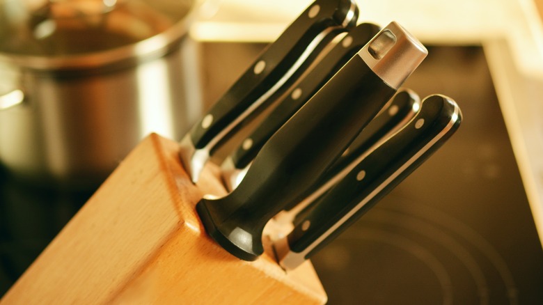 Knives in wooden knife block