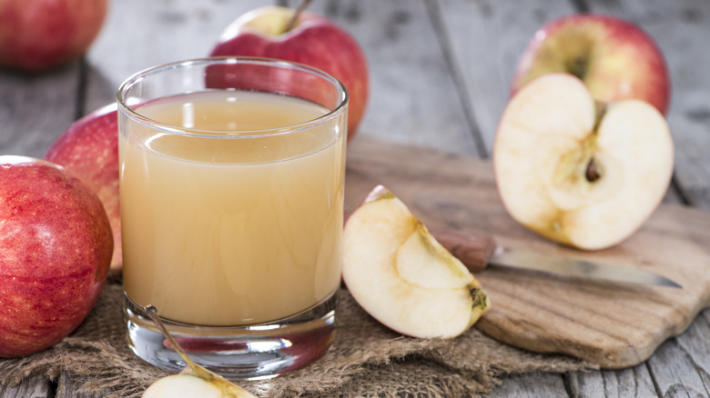 apple tea in a glass with fruit