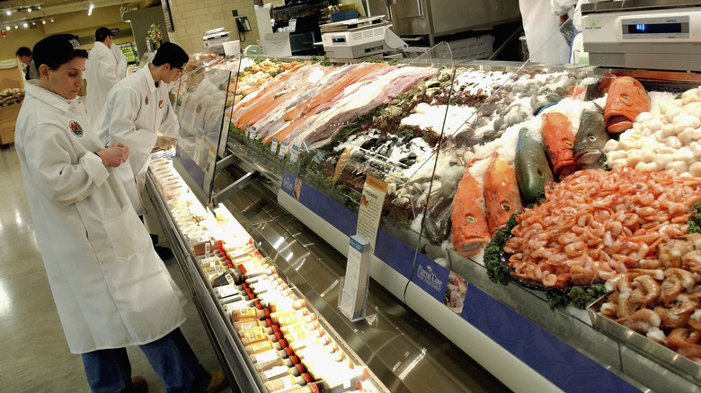 Whole Foods fish counter employees