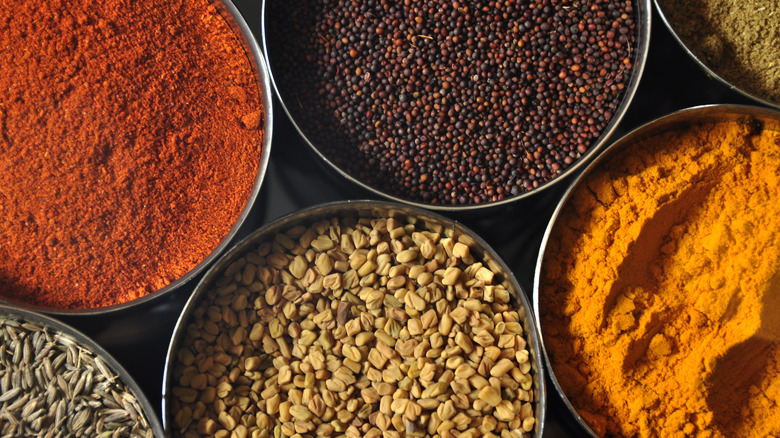 closeup of ground spices in bowls