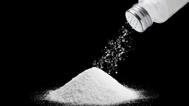 pouring pile of salt