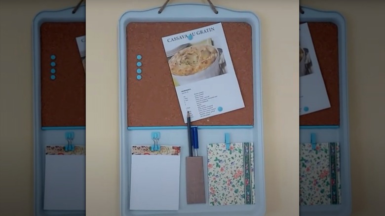 a chalkboard with magnets and sticky notes