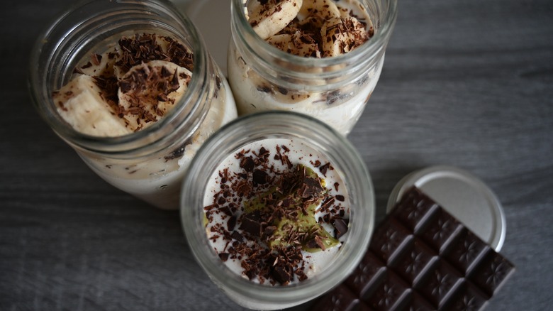 Ice cream in Mason jars topped with chocolate shavings