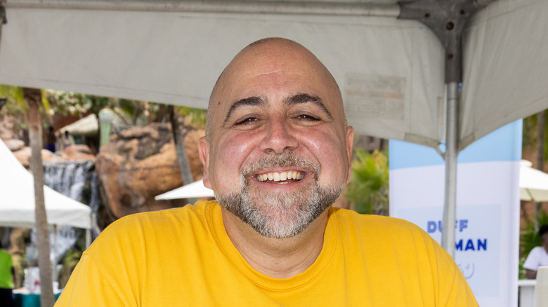 Duff Goldman in yellow shirt