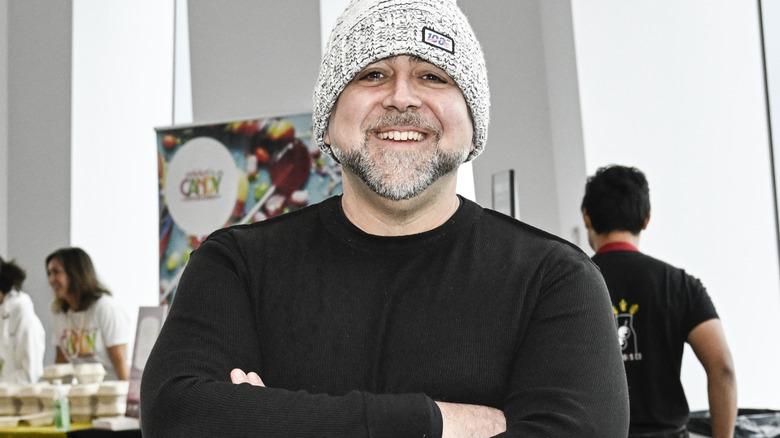 Chef Duff Goldman in grey beanie, smiling