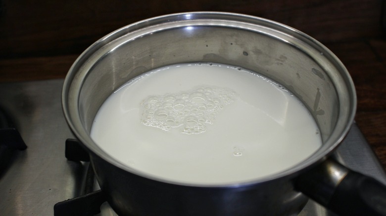 saucepan of milk on stove