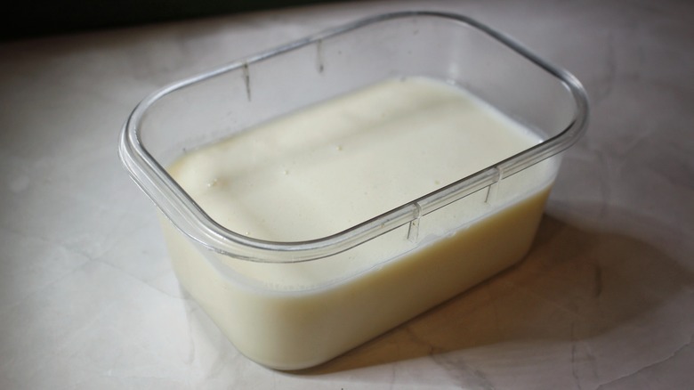 plastic container of pudding