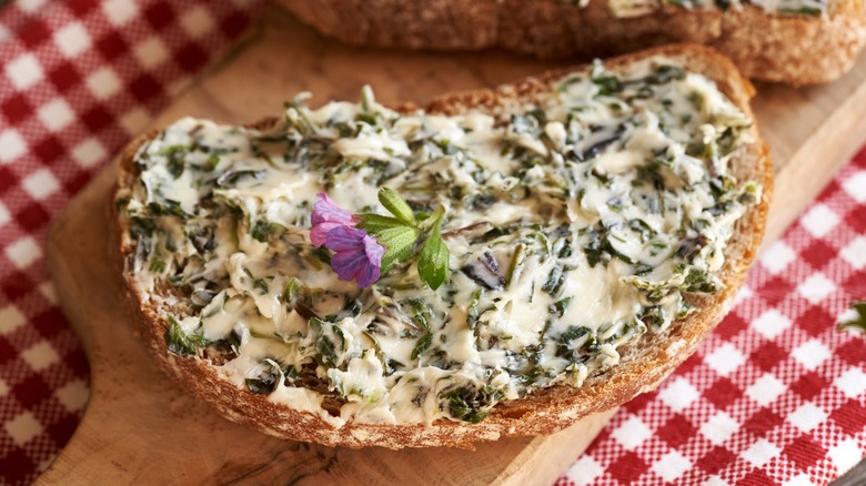 Toast with edible flower compound butter