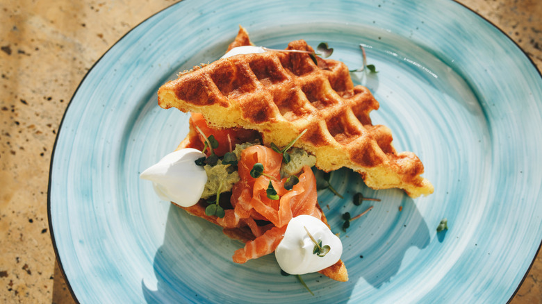Waffles with guacamole and sour cream
