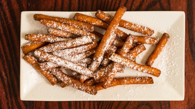 funnel cake fries with powdered sugar