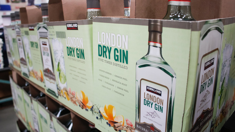 Boxes of Kirkland Signature London Dry Gin at a Costco warehouse