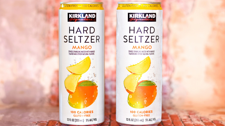 Two cans of Kirkland Signature mango hard seltzer