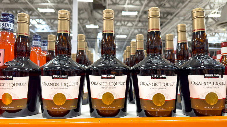 Bottles of Kirkland Signature orange liqueur on the shelf at a Costco warehouse