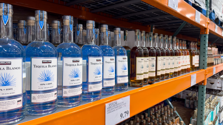 Bottles of Kirkland tequila on the shelves at a Costco warehouse