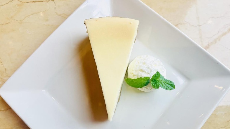 A slice of The Cheesecake Factory's Low-Licious Cheesecake is shown.