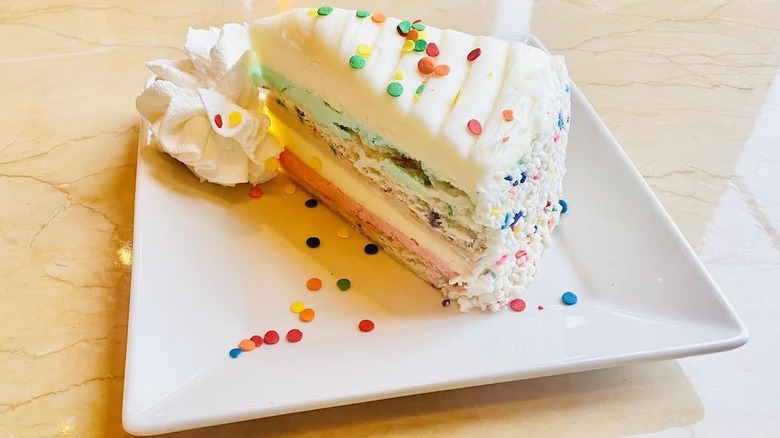 A slice of The Cheesecake Factory's Celebration Cheesecake is shown.