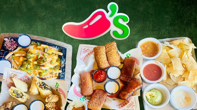 Chili's logo and overhead view of table full of Chili's appetizers