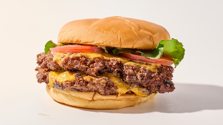Double cheeseburger on a table