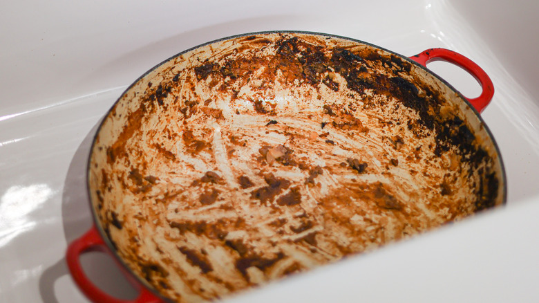 crusty pan in sink