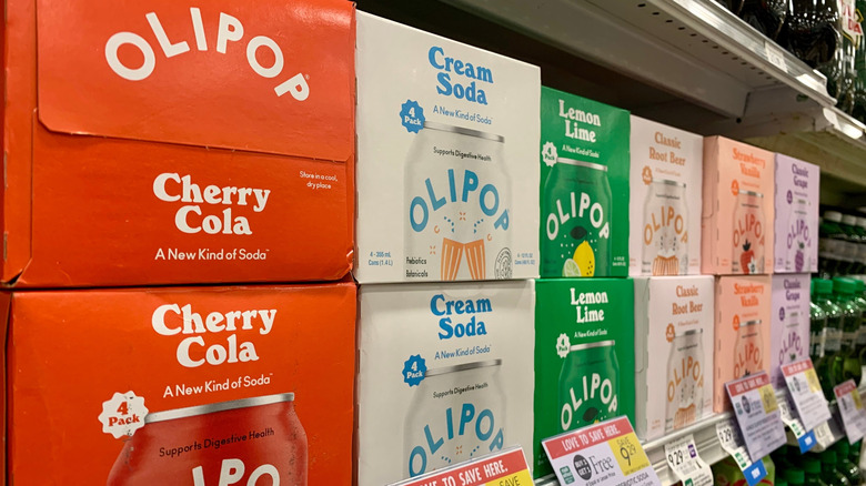 Cases of prebiotic soda in grocery store
