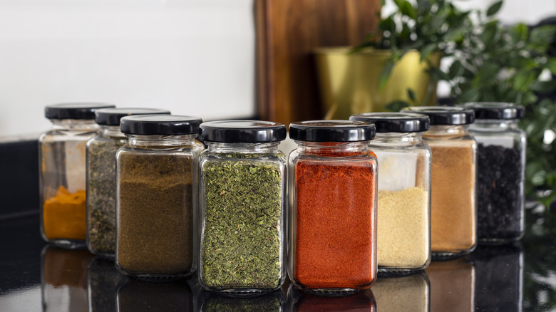 spices in jars on counter