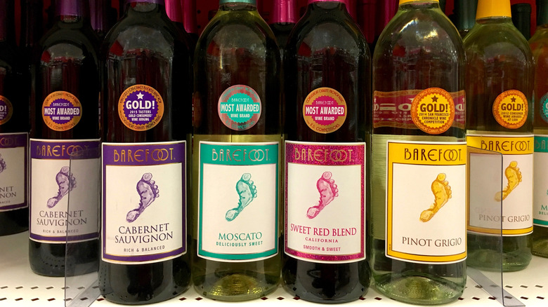 shelf of Barefoot wine bottles