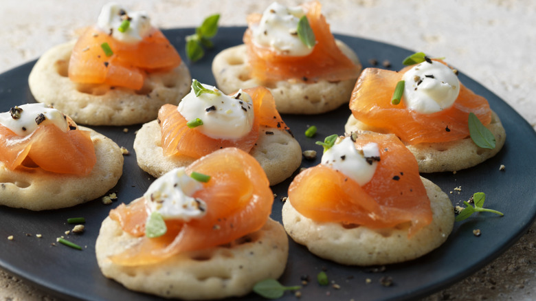 lox on canapés with sour cream