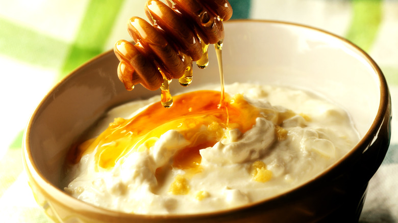 Drizzling honey into oatmeal