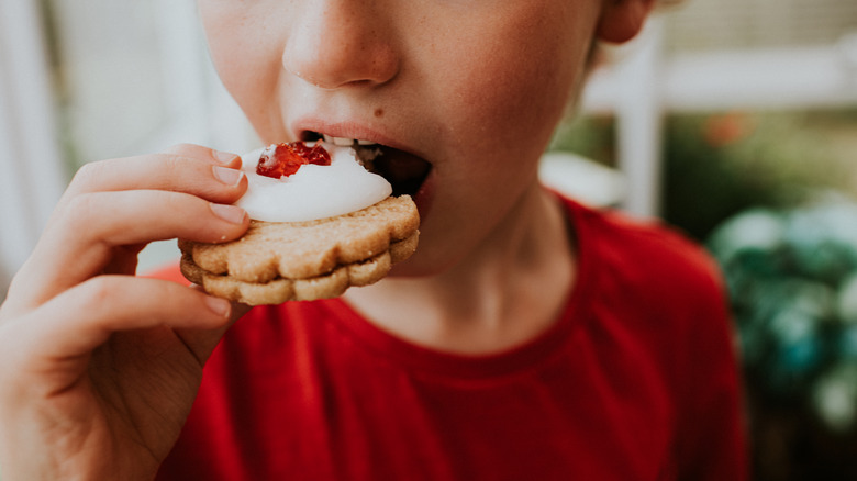 Boy eating a cookie