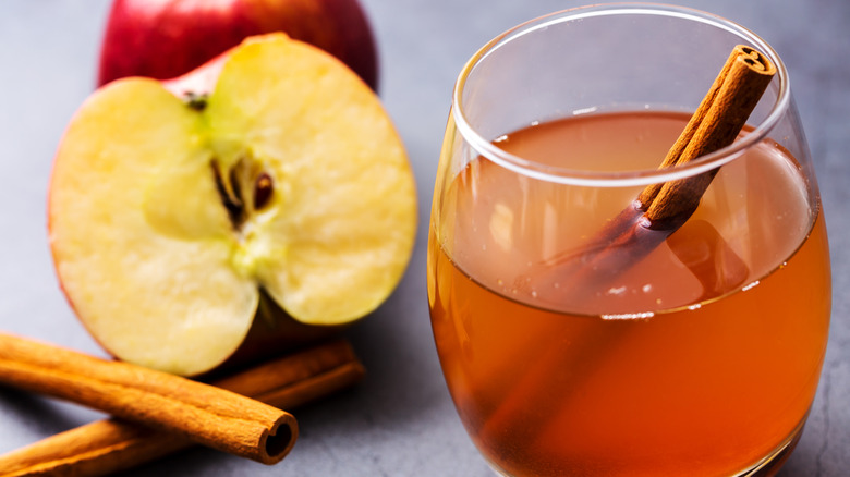 An apple cider cocktail in a glass