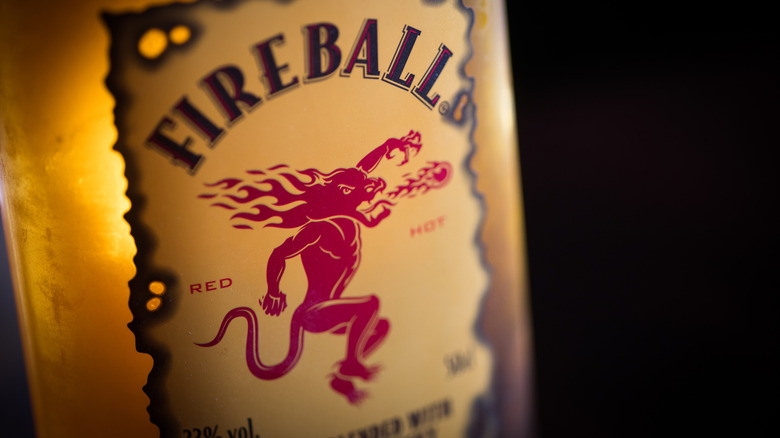 Closeup of the Fireball logo on a bottle of the Cinnamon Whisky