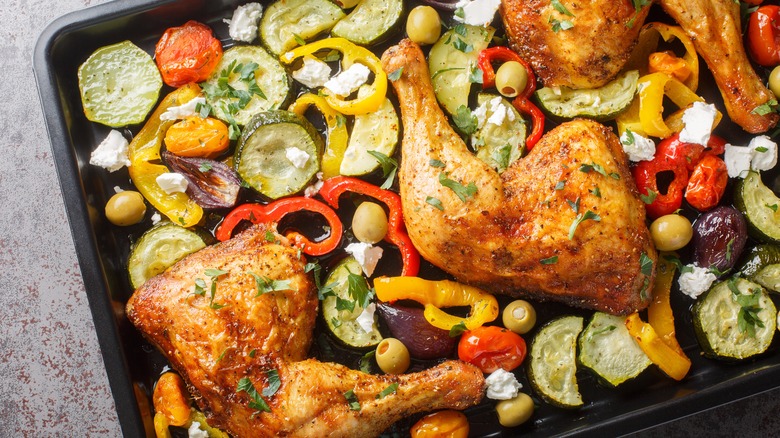 Sheet pan with chicken, vegetables, and feta