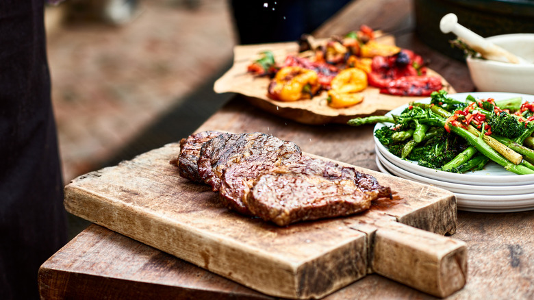 prepared steak served with sides