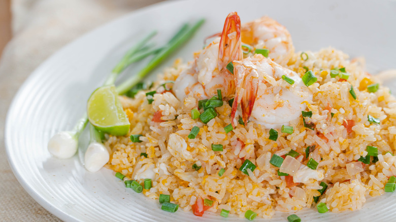 Shrimp fried rice on white plate. 