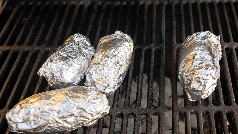 Grilling potatoes in aluminum foil