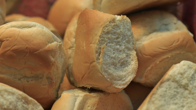 pile of white bread rolls