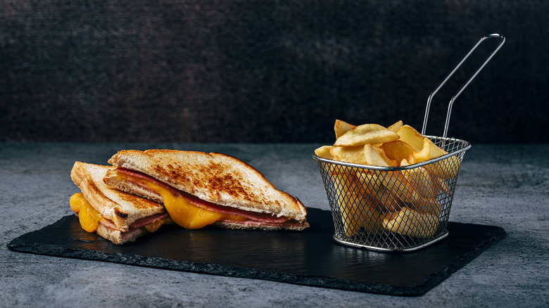 Grilled cheese sandwich with chips