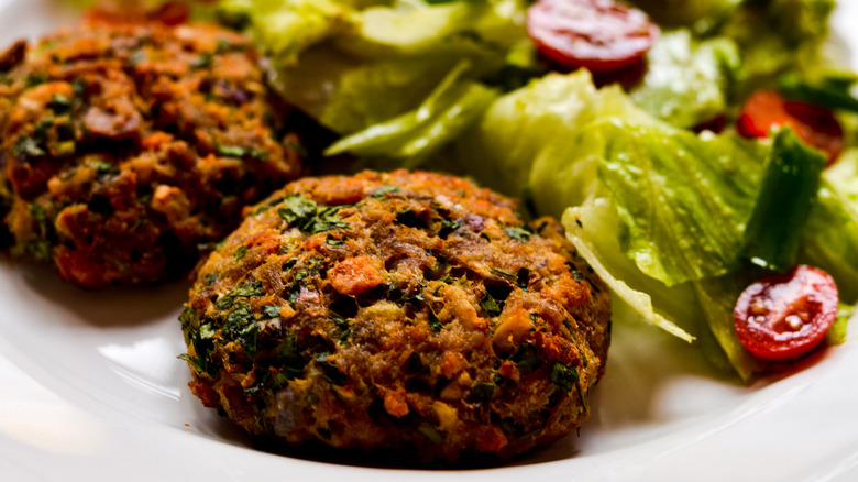 Salad with tuna meatballs on a plate