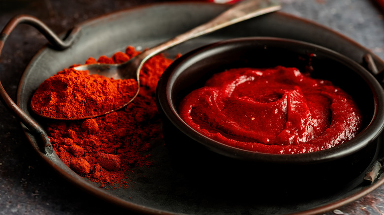 Gochujang and chili powder in bowls