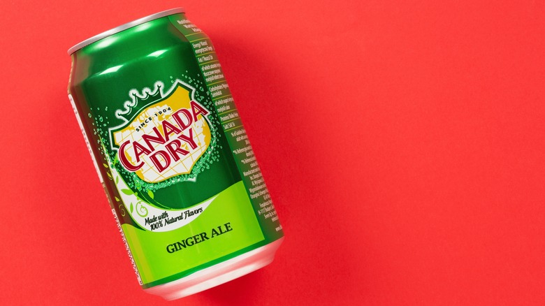 Canada Dry ginger ale on red background