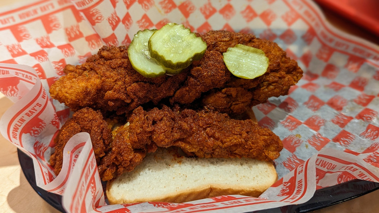 Nashville hot chicken tenders on white bread