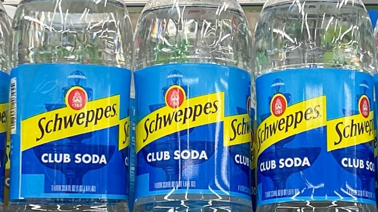 bottles of schweppes club soda