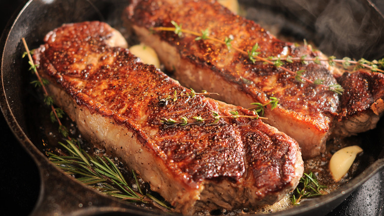 Seared steak with rosemary and garlic